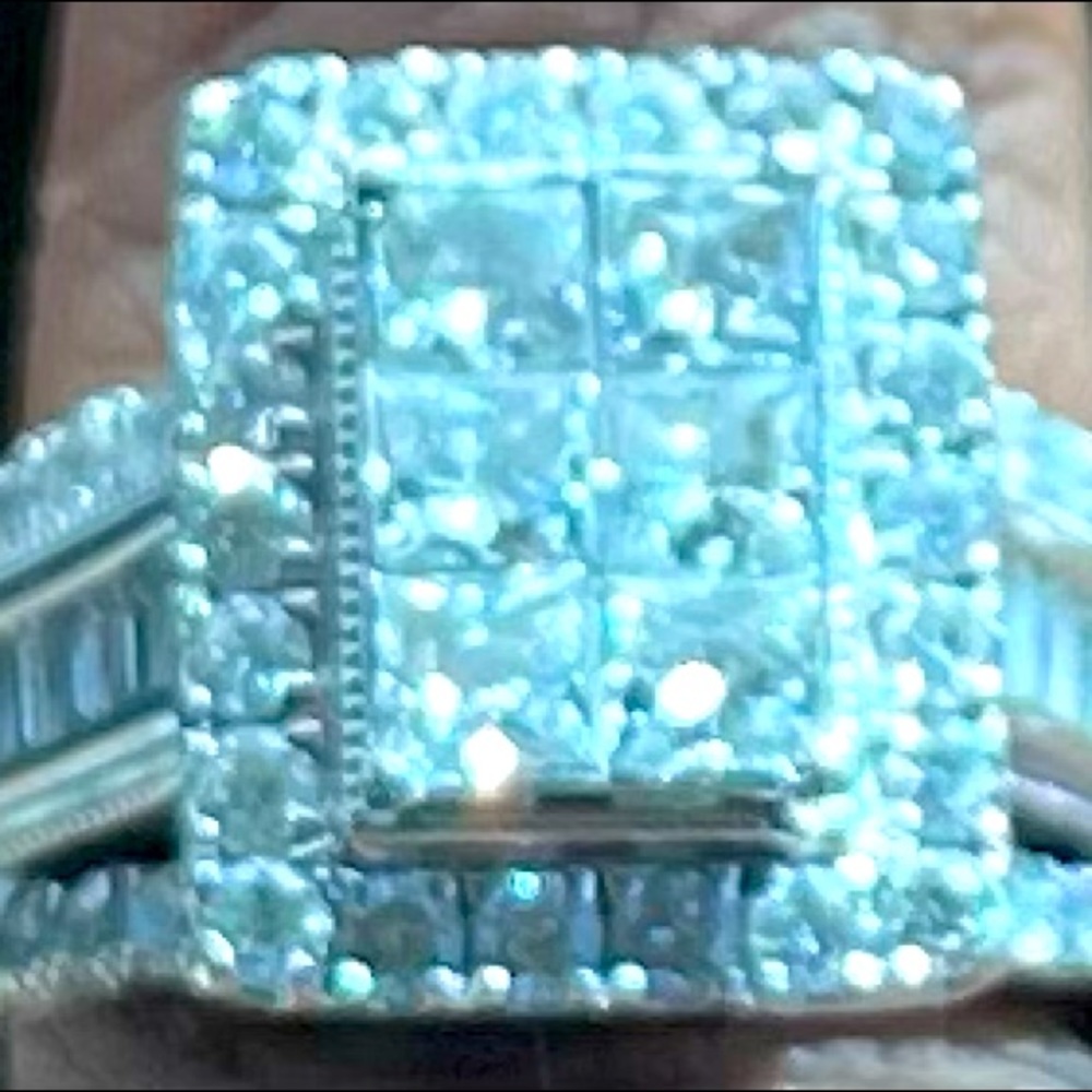 Diamond Ring 6.5 is sizable 2 carats